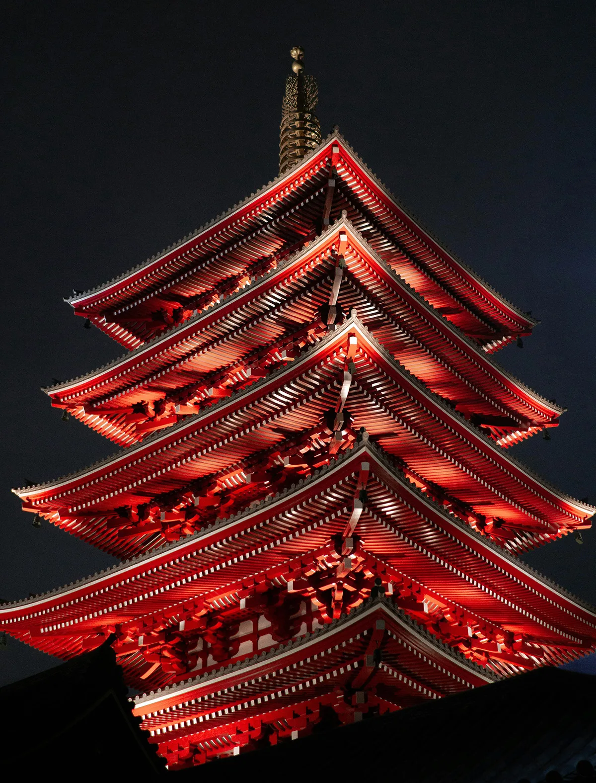 A five-storey pagoda, lit at night